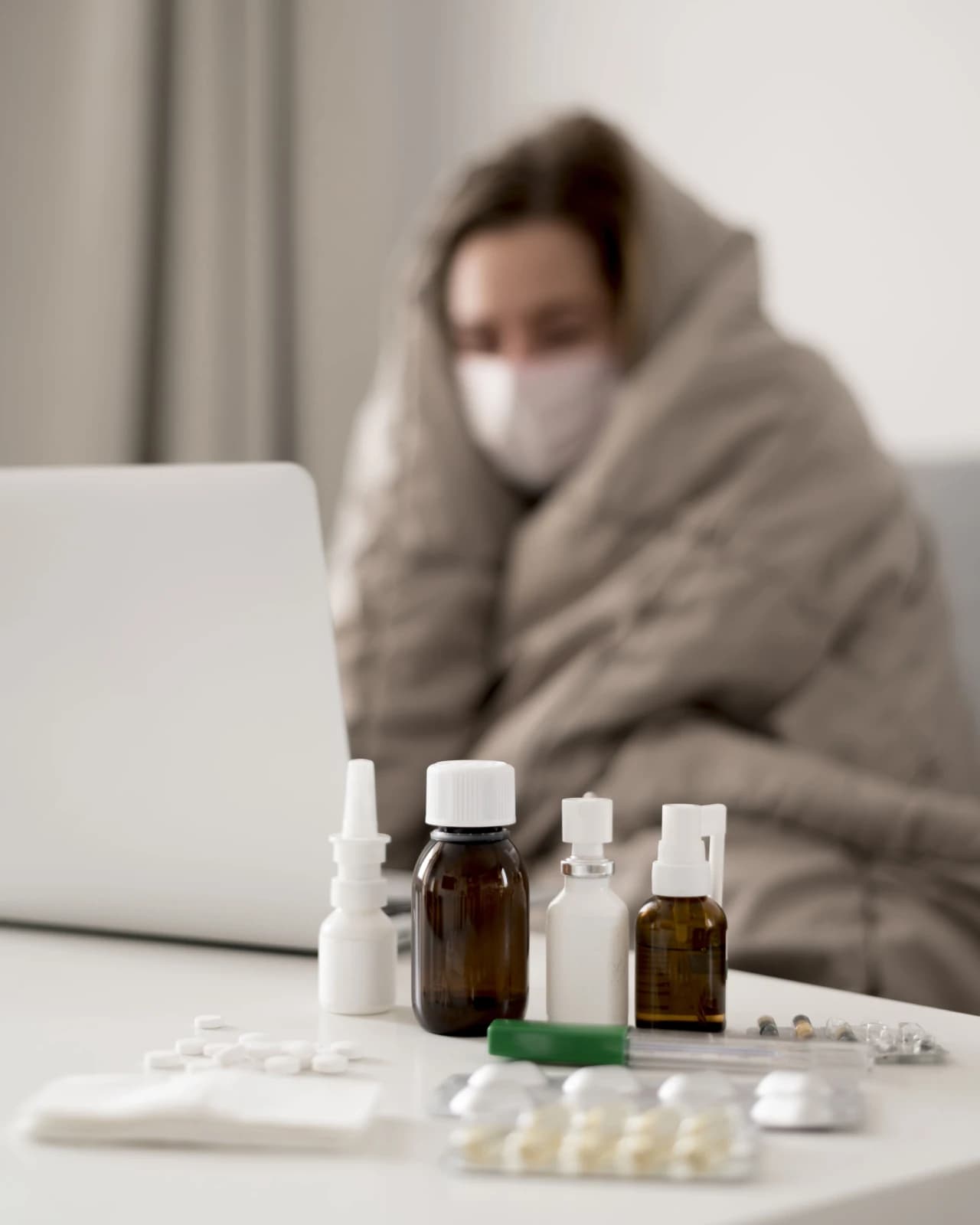woman-wearing-medical-mask-having-cold (1).jpg